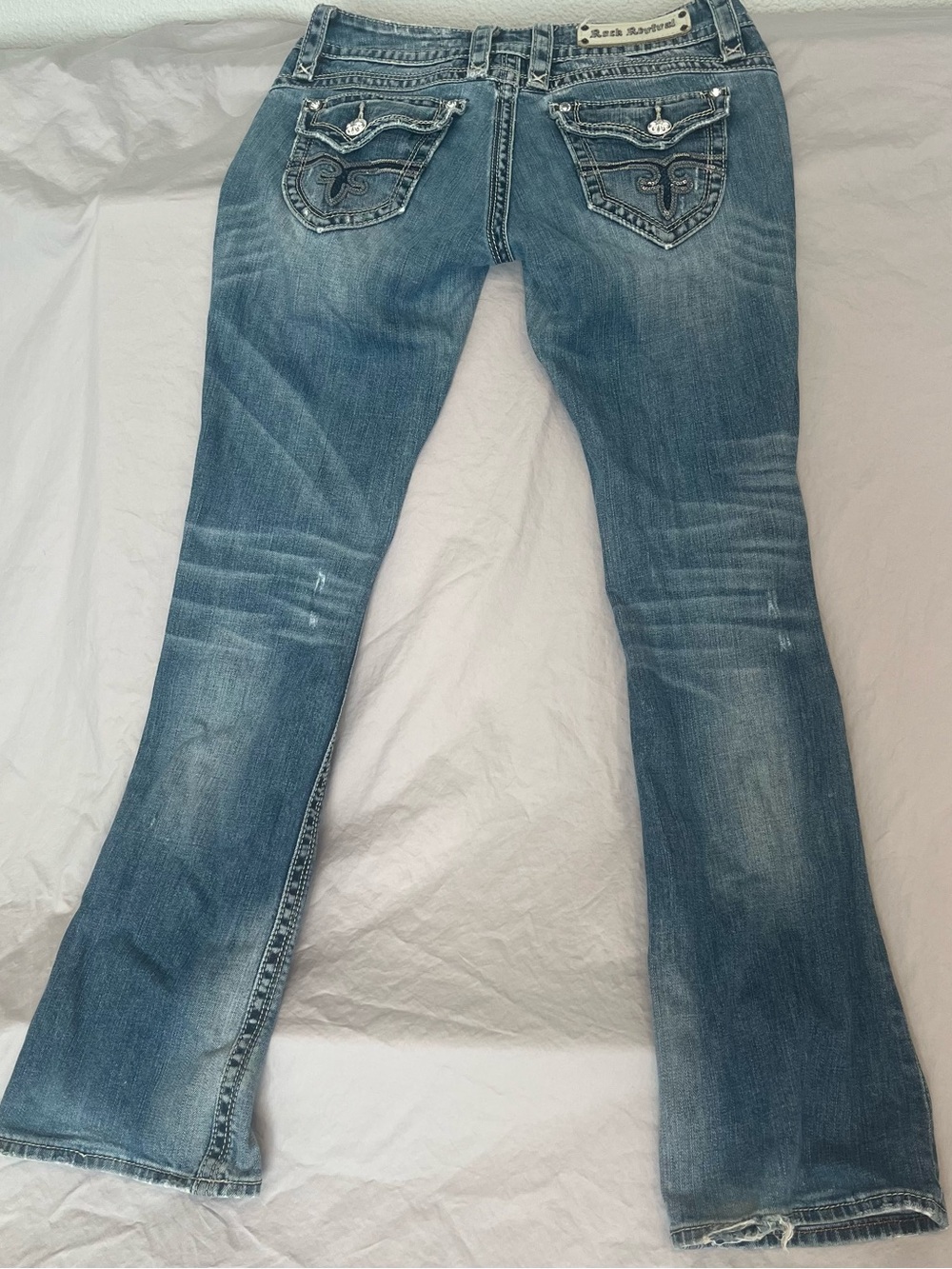 Rock Revival Distressed Blue Flare Jeans with Embellished Back Pockets